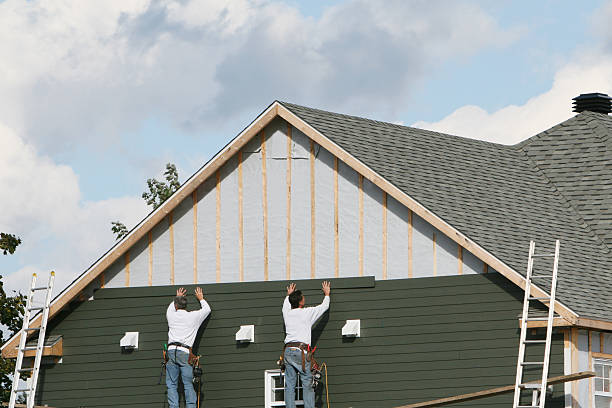 Professional Siding technician working in Huntington Station, NY